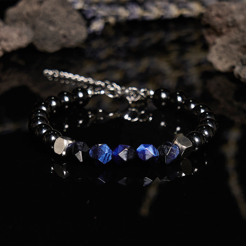 Bracciale Olivenorma in perline di ossidiana blu sfaccettata con occhio di tigre