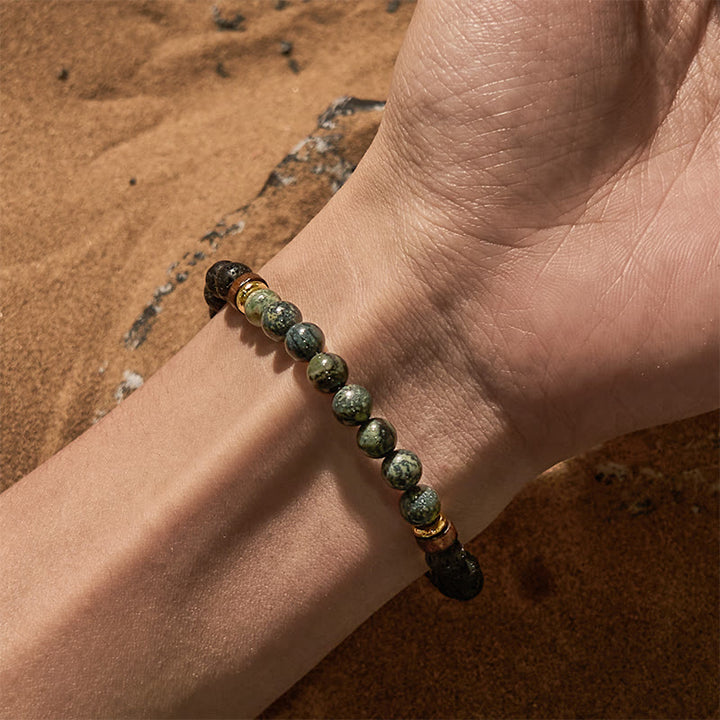 Bracciale di perline in pietra lavica turchese africano Olivenorma
