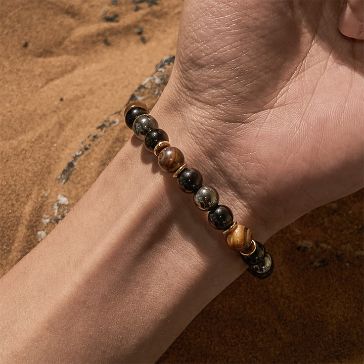 Bracciale Olivenorma con perline in ematite e occhio di tigre in ossidiana da 8 mm