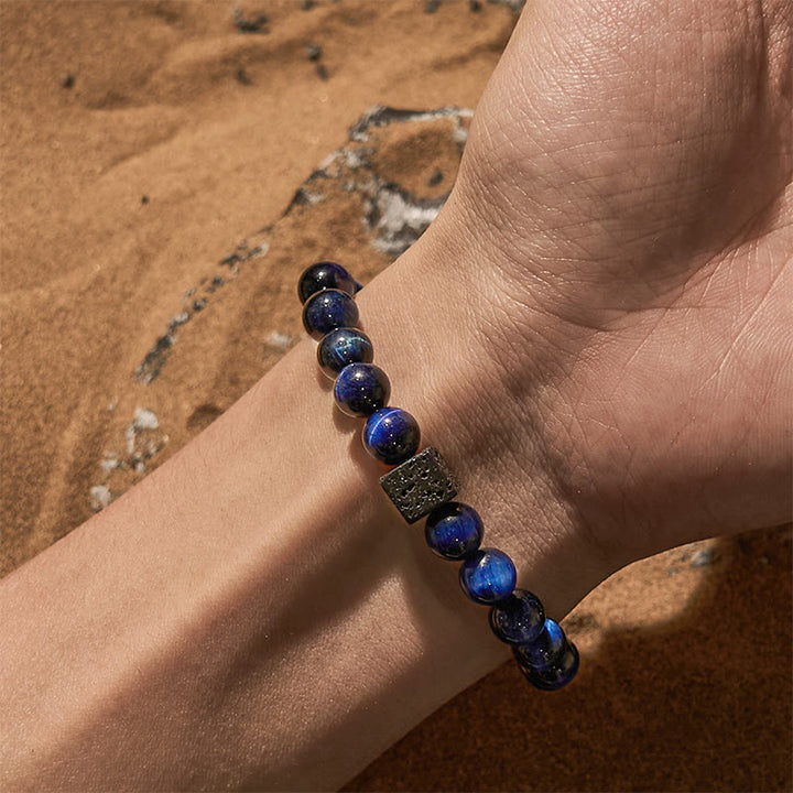 Braccialetto di perline in pietra lavica con occhio di tigre blu Olivenorma