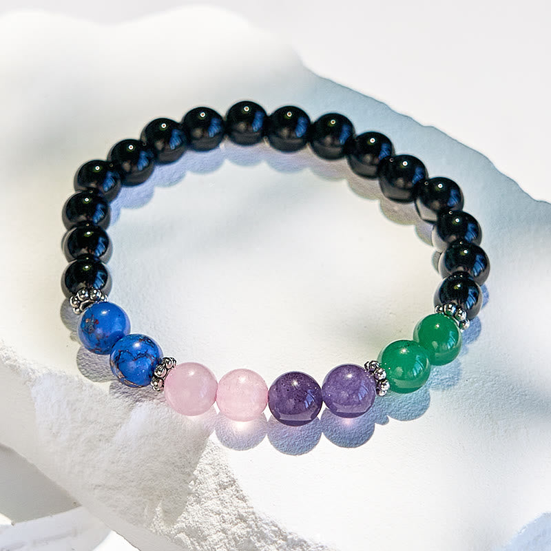Bracciale Olivenorma con perline in ossidiana, lapislazzuli e quarzo rosa