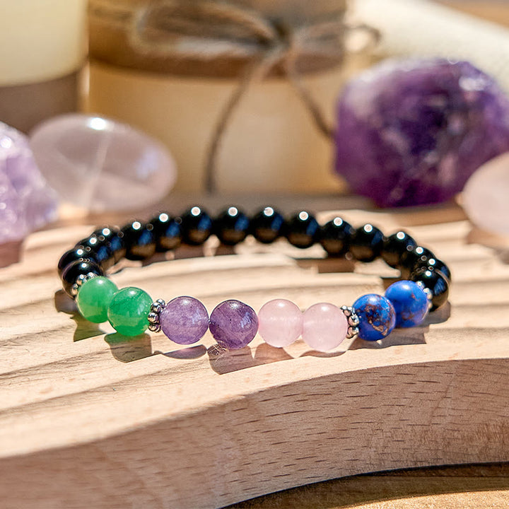 Bracciale Olivenorma con perline in ossidiana, lapislazzuli e quarzo rosa
