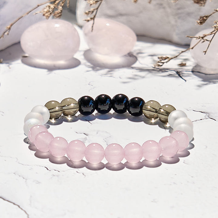 Bracciale Olivenorma con perline in quarzo rosa, ossidiana e pietra di luna