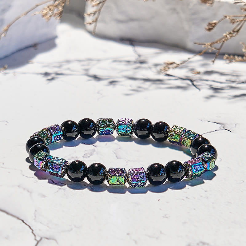 Bracciale di perline in pietra lavica e ematite elettroplaccata Olivenorma con onice nero