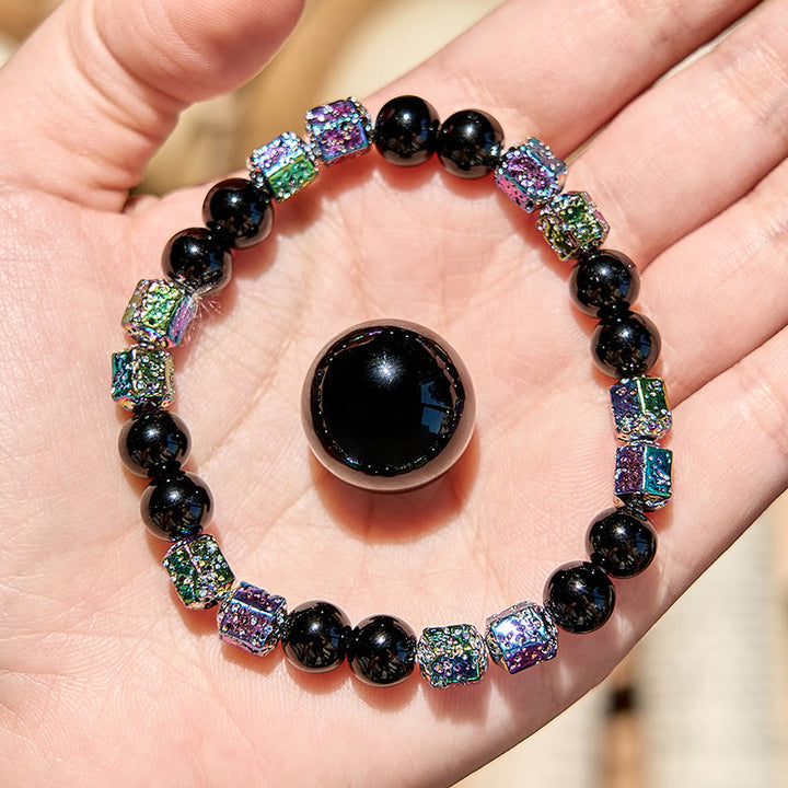 Bracciale di perline in pietra lavica e ematite elettroplaccata Olivenorma con onice nero