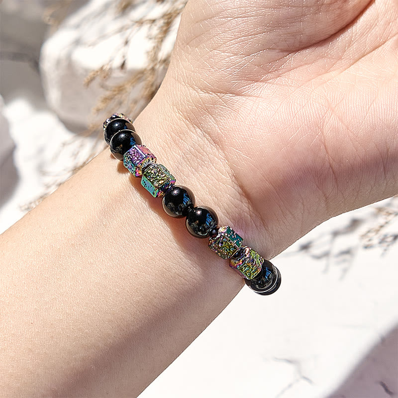 Bracciale di perline in pietra lavica e ematite elettroplaccata Olivenorma con onice nero