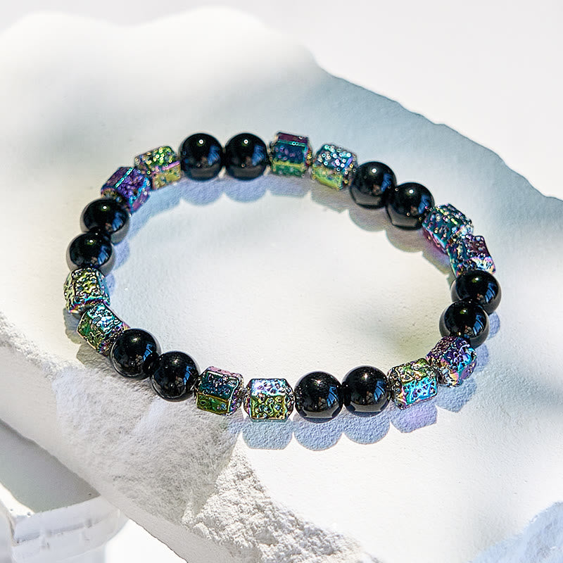 Bracciale di perline in pietra lavica e ematite elettroplaccata Olivenorma con onice nero