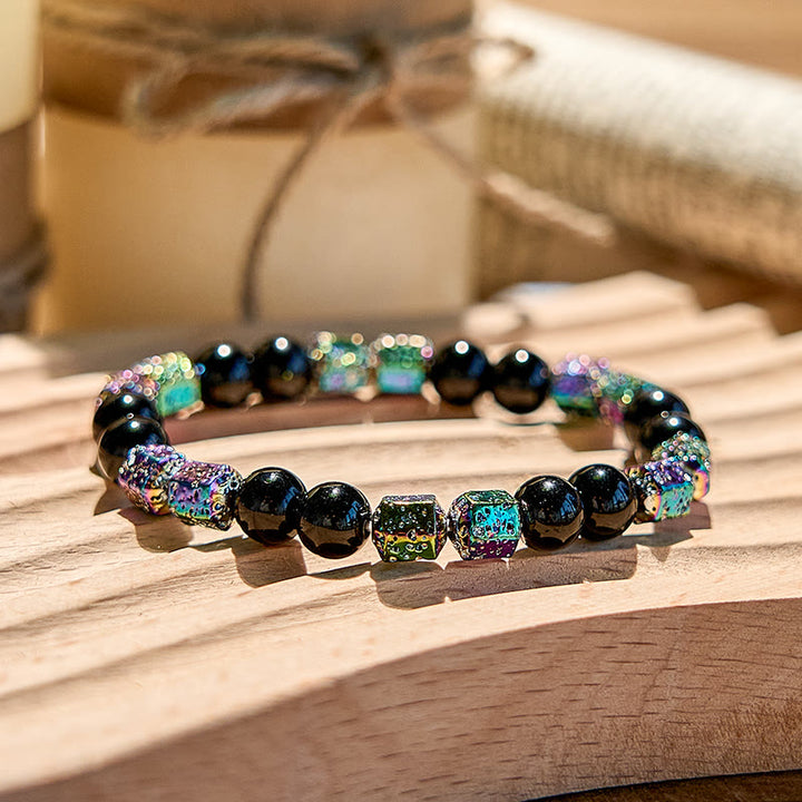 Bracciale di perline in pietra lavica e ematite elettroplaccata Olivenorma con onice nero