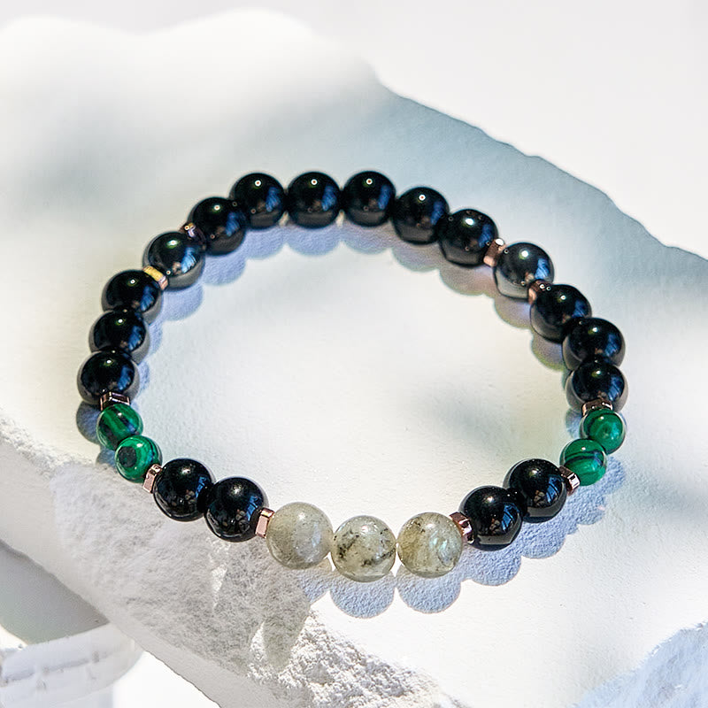 Bracciale Olivenorma con perline in onice nero, ematite, labradorite, malachite