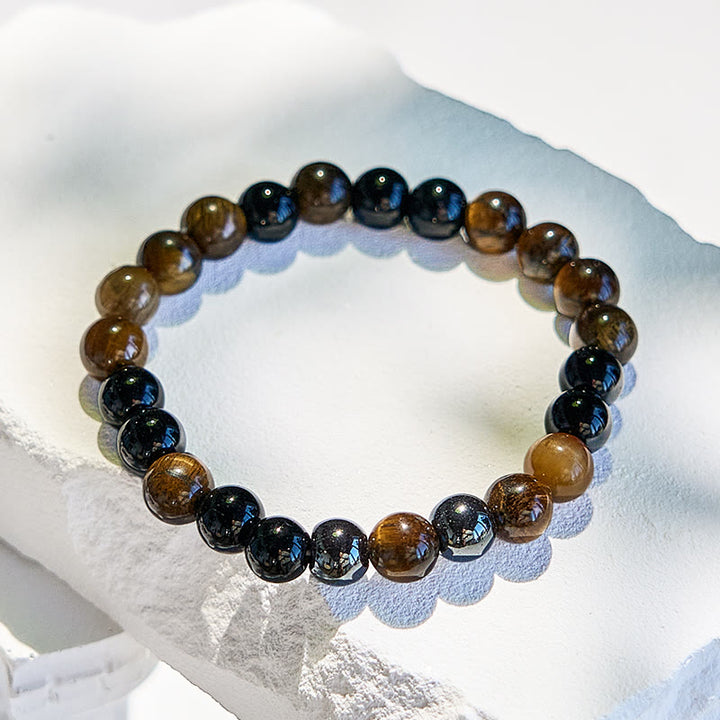 Bracciale Olivenorma in perline di ossidiana con occhio di tigre da 8 mm
