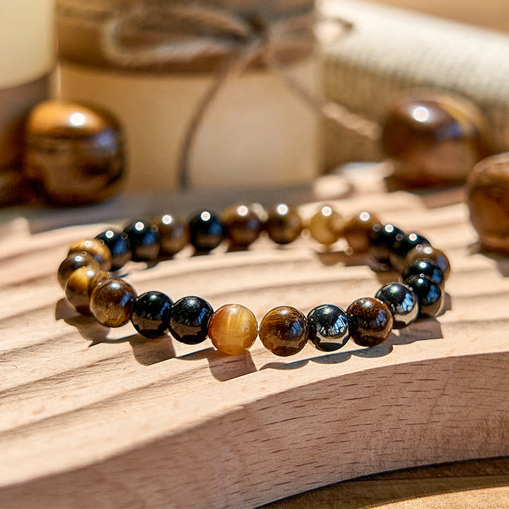 Bracciale Olivenorma in perline di ossidiana con occhio di tigre da 8 mm