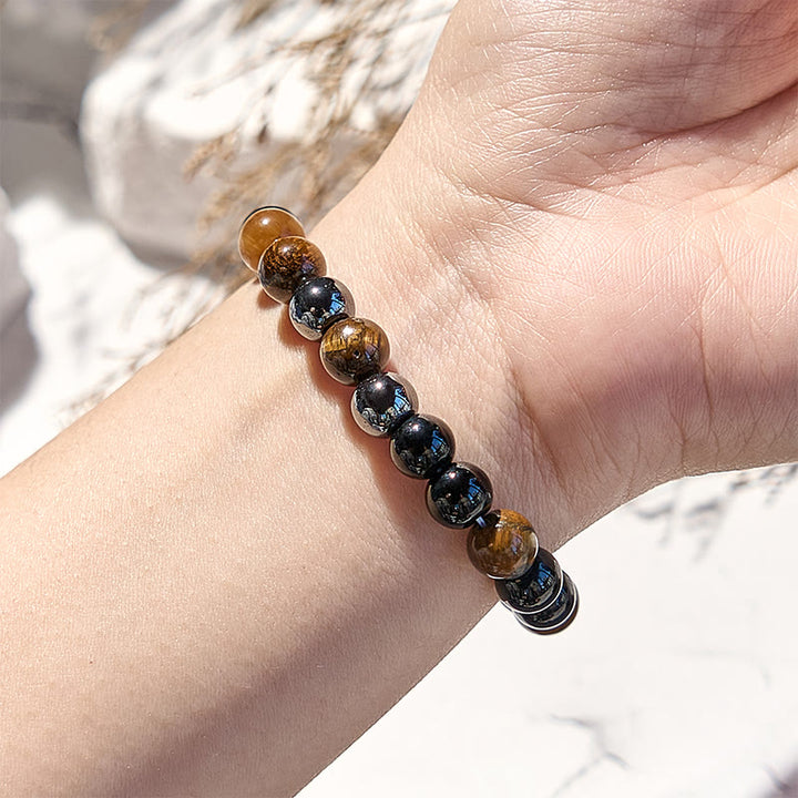 Bracciale Olivenorma in perline di ossidiana con occhio di tigre da 8 mm