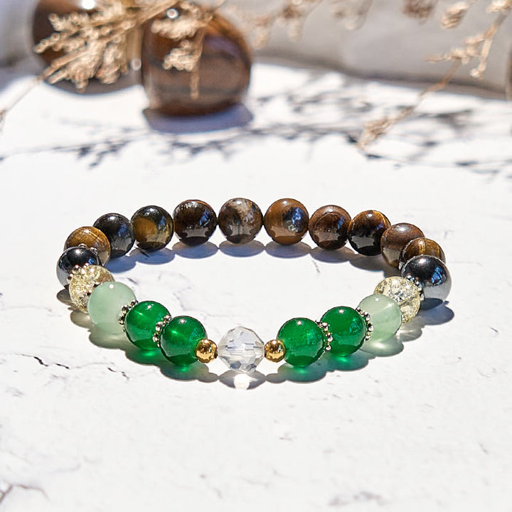 Bracciale Olivenorma con perline di ematite, occhio di tigre e peridoto