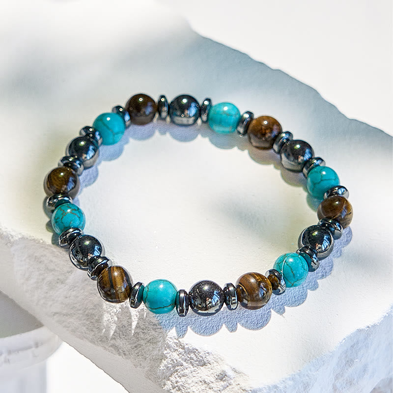 Bracciale Olivenorma in ematite, occhio di tigre, turchese e perline