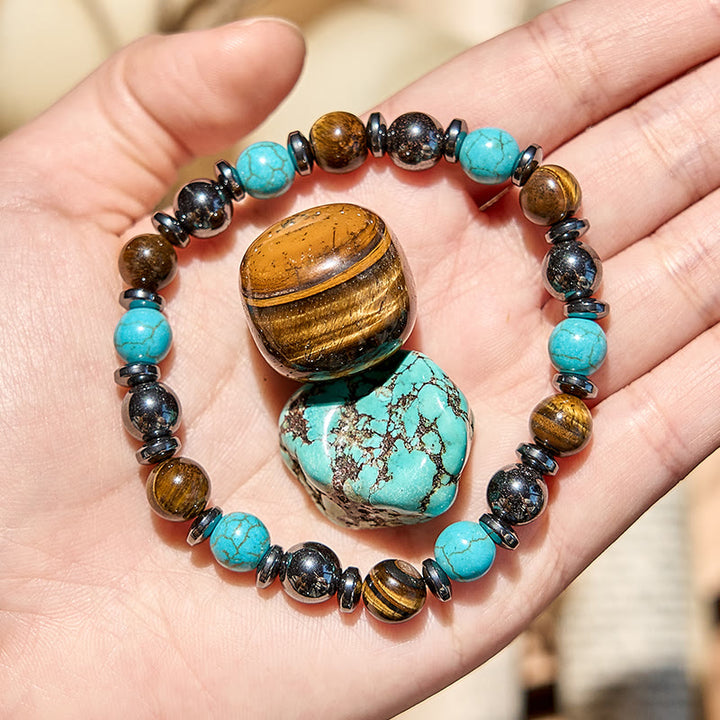 Bracciale Olivenorma in ematite, occhio di tigre, turchese e perline
