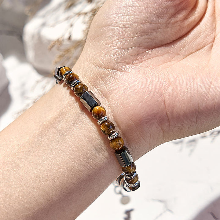 Bracciale Olivenorma con perline in occhio di tigre ematite a 6 cilindri