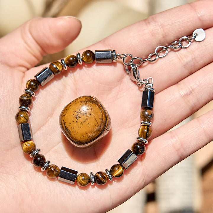 Bracciale Olivenorma con perline in occhio di tigre ematite a 6 cilindri