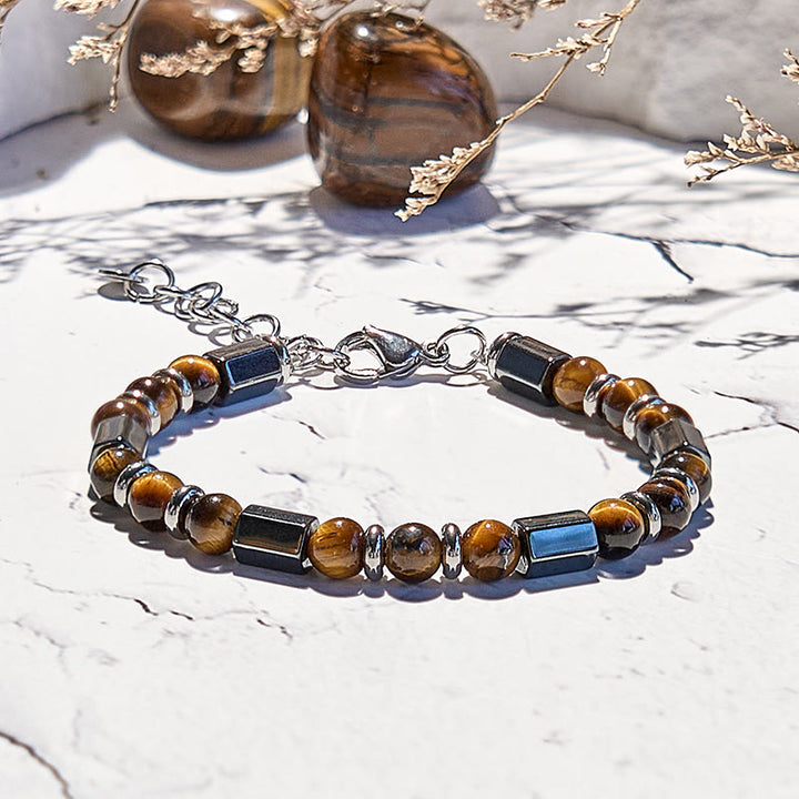 Bracciale Olivenorma con perline in occhio di tigre ematite a 6 cilindri