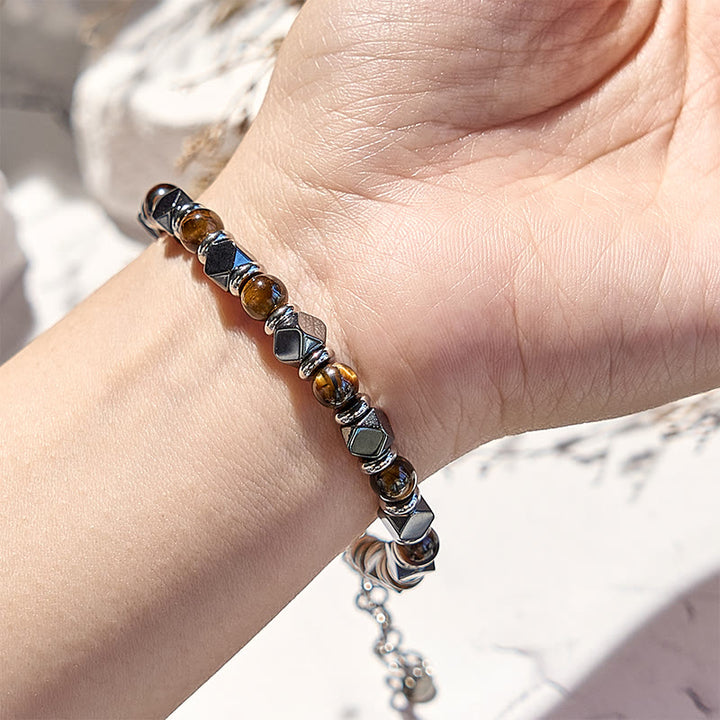 Bracciale Olivenorma con perline in occhio di tigre, ematite e diamanti