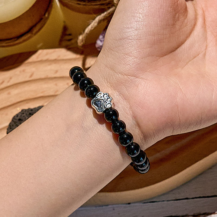 Bracciale con ciondolo a forma di zampa di cane con perline in pietra naturale Olivenorma 