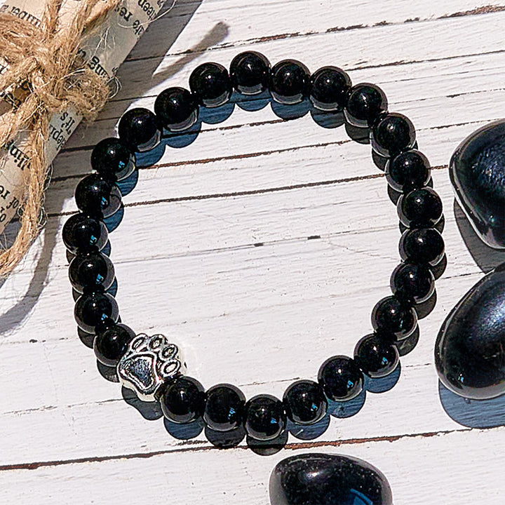 Bracciale con ciondolo a forma di zampa di cane con perline in pietra naturale Olivenorma 