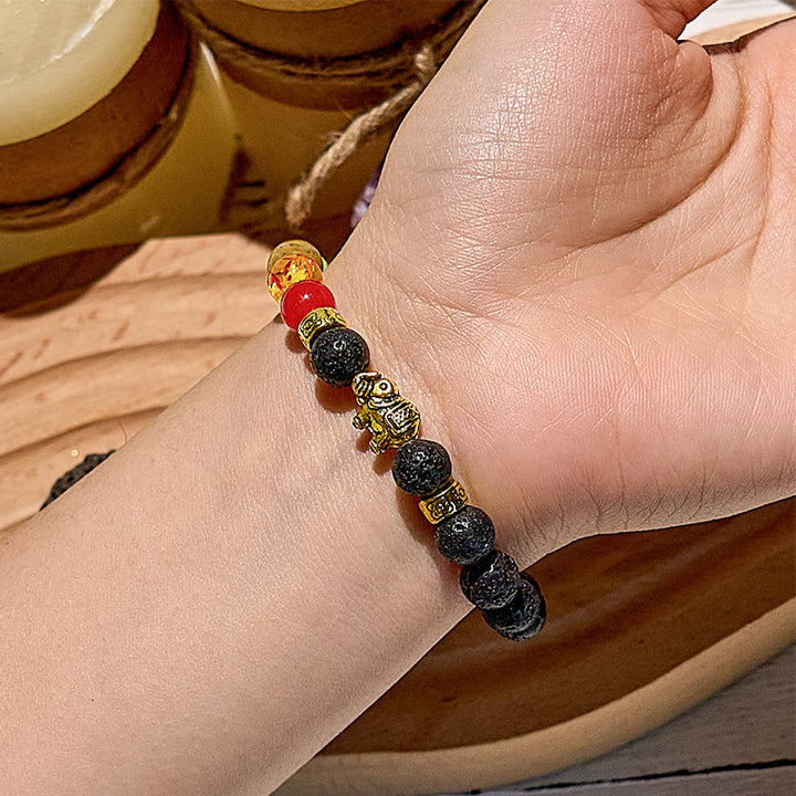Bracciale con perline con ciondolo elefante Chakra in pietra lavica Olivenorma 