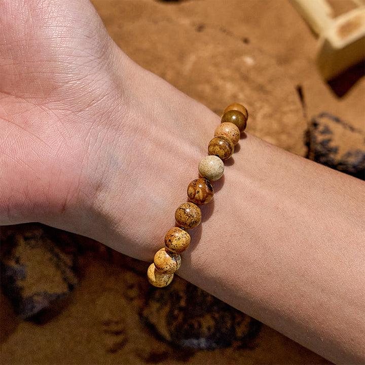 Bracciale in filo di rame dorato con perline in pietra naturale Olivenorma 