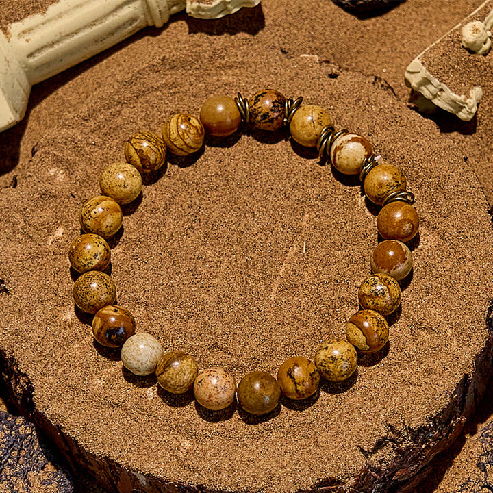Bracciale in filo di rame dorato con perline in pietra naturale Olivenorma 