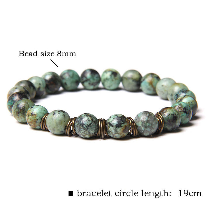 Bracciale in filo di rame dorato con perline in pietra naturale Olivenorma 