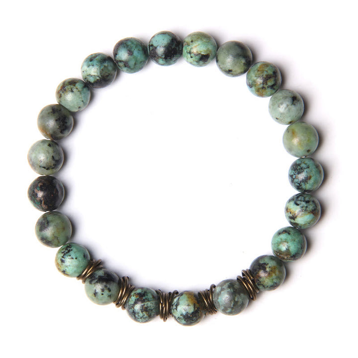 Bracciale in filo di rame dorato con perline in pietra naturale Olivenorma 