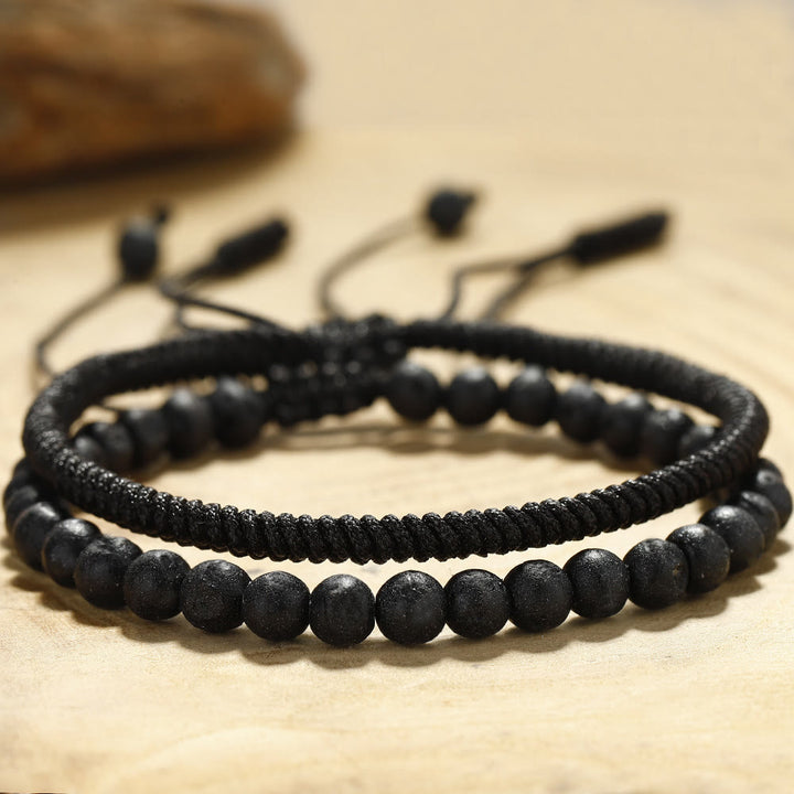 Bracciale intrecciato con perline di pietra lavica naturale Olivenorma