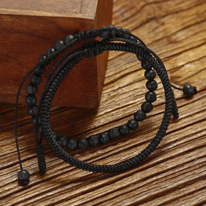 Bracciale intrecciato con perline di pietra lavica naturale Olivenorma