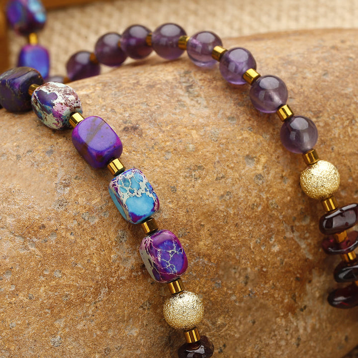 Bracciale Olivenorma con perline di pietra dell'imperatore viola, ametista e granato