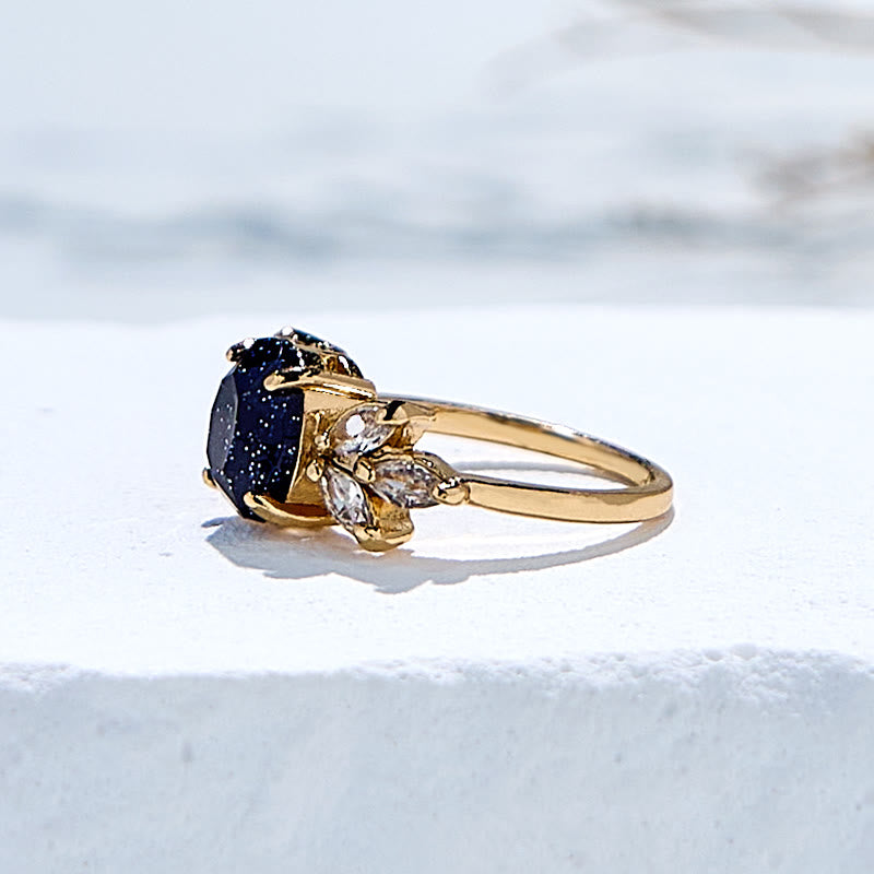Anello Olivenorma con foglia di zircone in arenaria blu taglio ovale