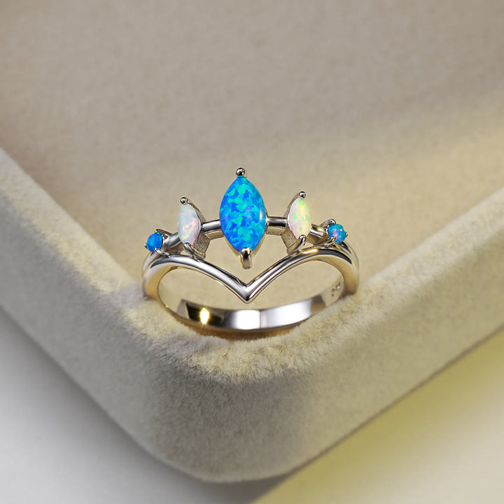 Anello a corona con opale naturale blu e bianco Olivenorma
