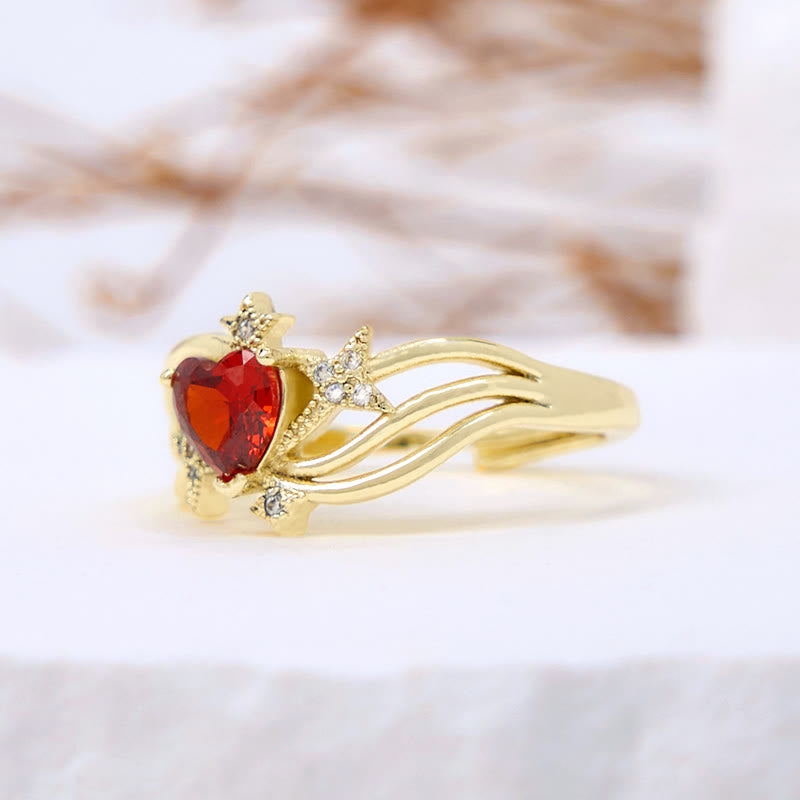Anello Olivenorma a forma di cuore con granato e stella in zircone bianco