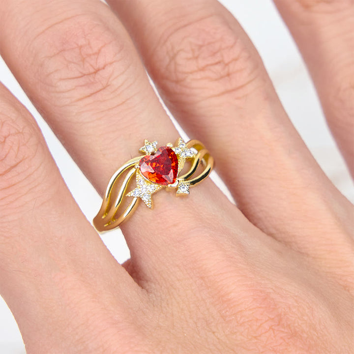 Anello Olivenorma a forma di cuore con granato e stella in zircone bianco