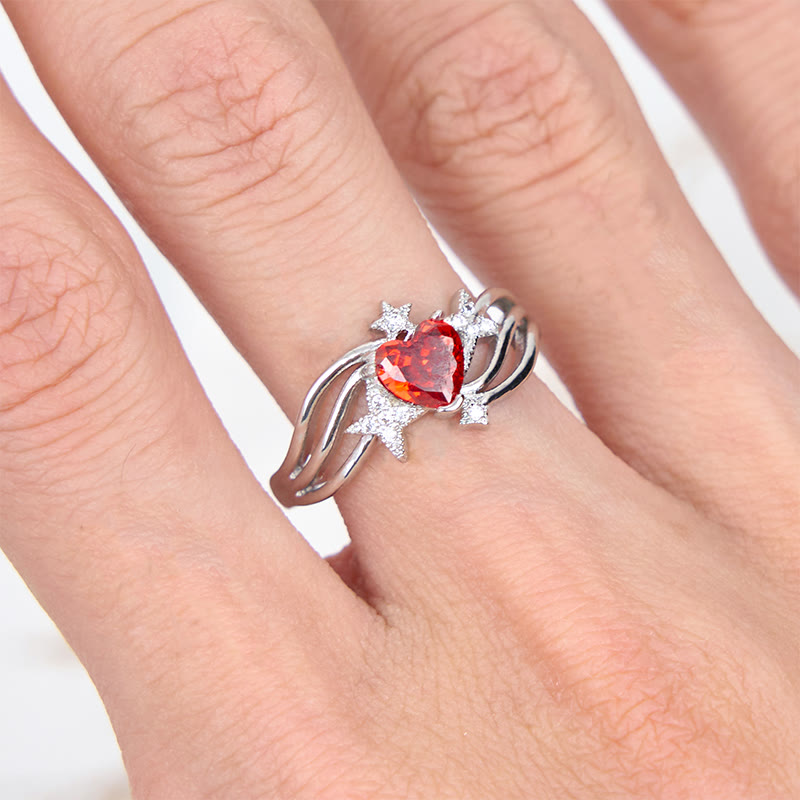 Anello Olivenorma a forma di cuore con granato e stella in zircone bianco
