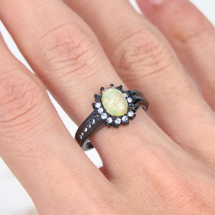 Anello girasole con zircone bianco e opale ovale Olivenorma