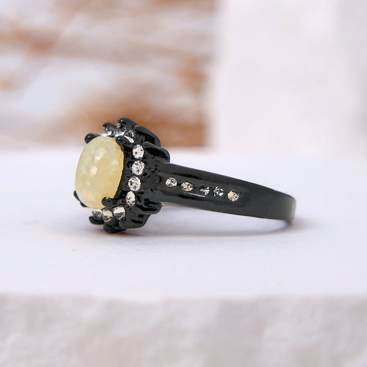 Anello girasole con zircone bianco e opale ovale Olivenorma
