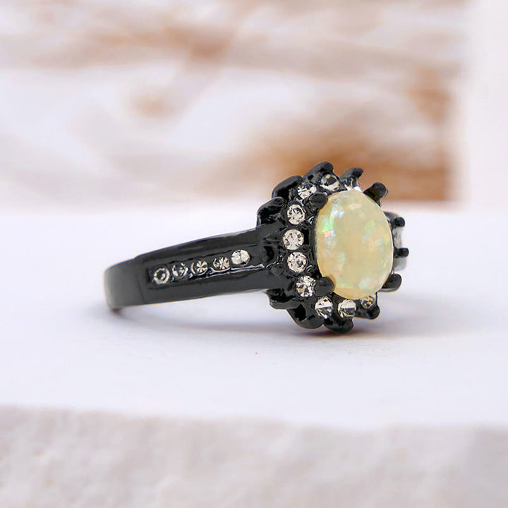 Anello girasole con zircone bianco e opale ovale Olivenorma
