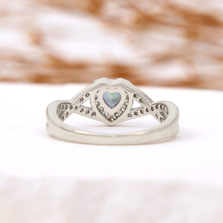 Anello Olivenorma a forma di cuore con alessandrite a forma di croce infinita