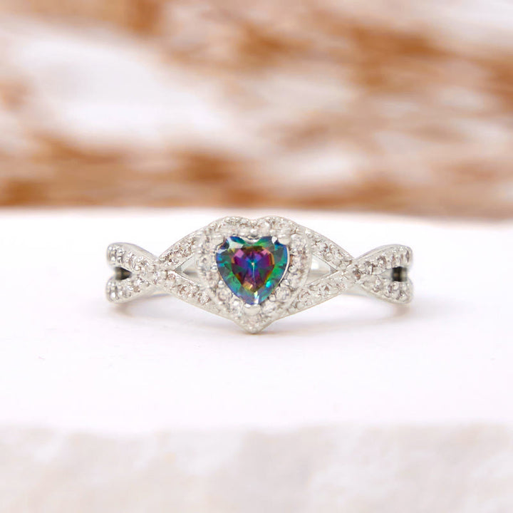 Anello Olivenorma a forma di cuore con alessandrite a forma di croce infinita