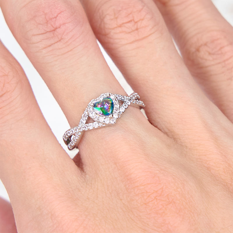 Anello Olivenorma a forma di cuore con alessandrite a forma di croce infinita