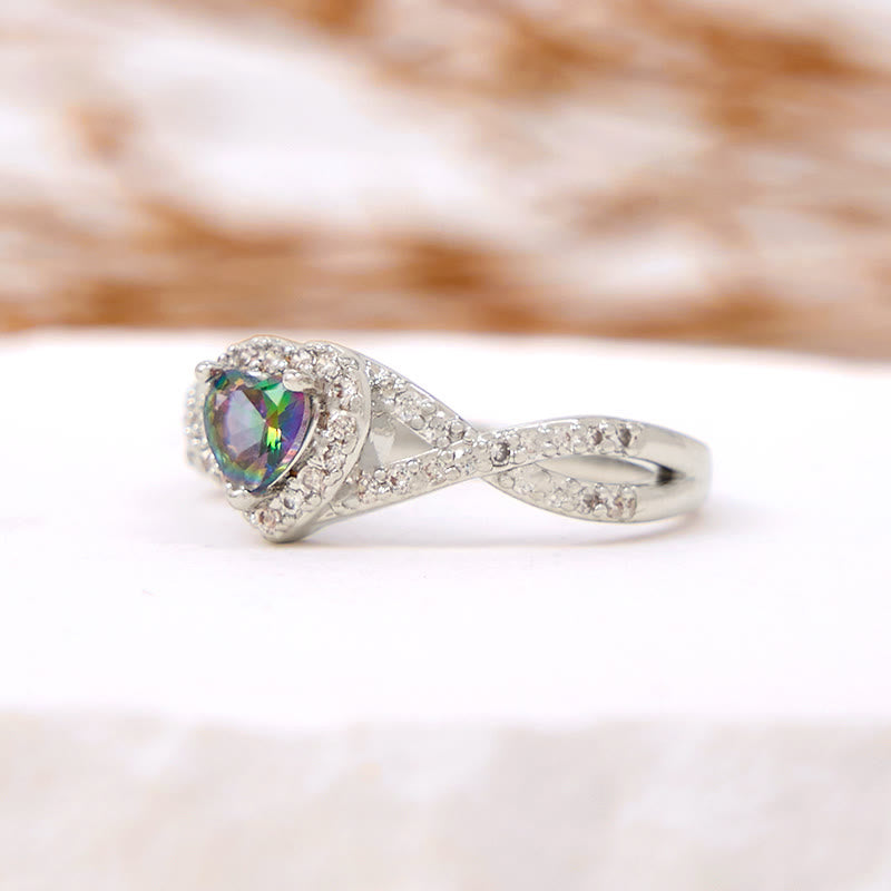 Anello Olivenorma a forma di cuore con alessandrite a forma di croce infinita