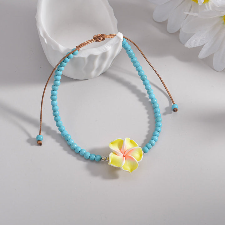 Olivenorma cavigliera con perline Plumeria turchese