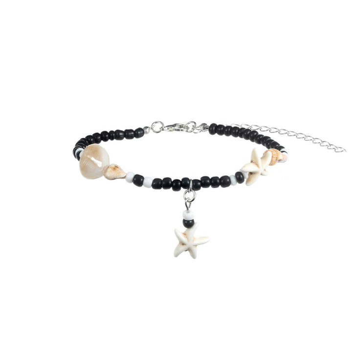 Olivenorma cavigliera con perline a forma di lumaca, stella marina, onice nero turchese
