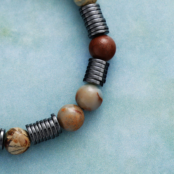 Bracciale Olivenorma da 8 mm con perline di agalmatolite ematite e unakite
