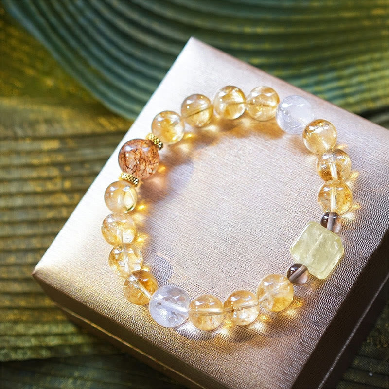 Bracciale Olivenorma in oro con perline di quarzo rutilato e citrino