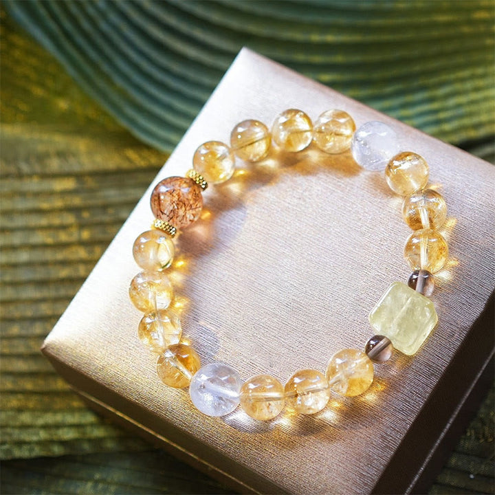 Bracciale Olivenorma in oro con perline di quarzo rutilato e citrino